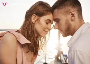 couple love closing eyes touching with forehead